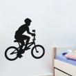 Stickers de silhouettes et personnages - Sticker Jeune homme sur une bicyclette - ambiance-sticker.com