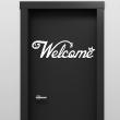 Wall decals with quotes - Quote door wall decal smiling welcome - ambiance-sticker.com