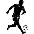 Vinilos deportes y el fútbol - Vinilo decorativo Jugador de fútbol con una pelota - ambiance-sticker.com