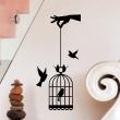 Stickers muraux Animaux - Sticker main tenant cage à oiseaux - ambiance-sticker.com
