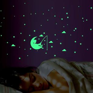 Muursticker Fosforescerend kind op de maan tussen de sterren