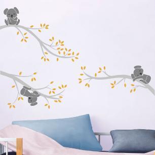 Cute koalas on the branches wall decal