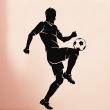 Muurstickers sport en voetbal - Muursticker Voetballer jongleren - ambiance-sticker.com