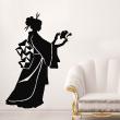 Muurstickers silhouettes - Muursticker Japanse figuur met een bloem - ambiance-sticker.com